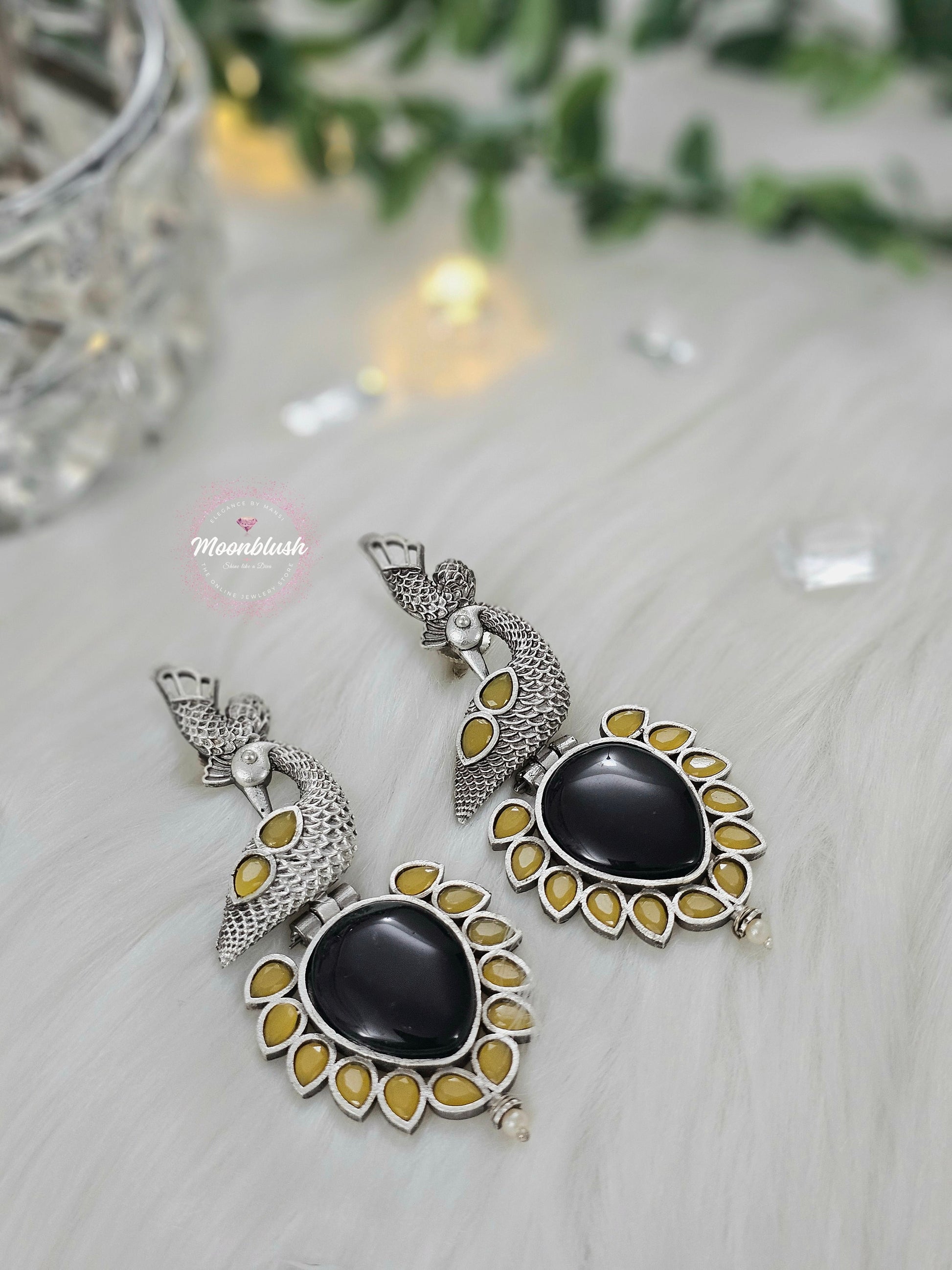 Dazzling Long earrings in unique pattern. Silver Replica with Monalisa Stones.