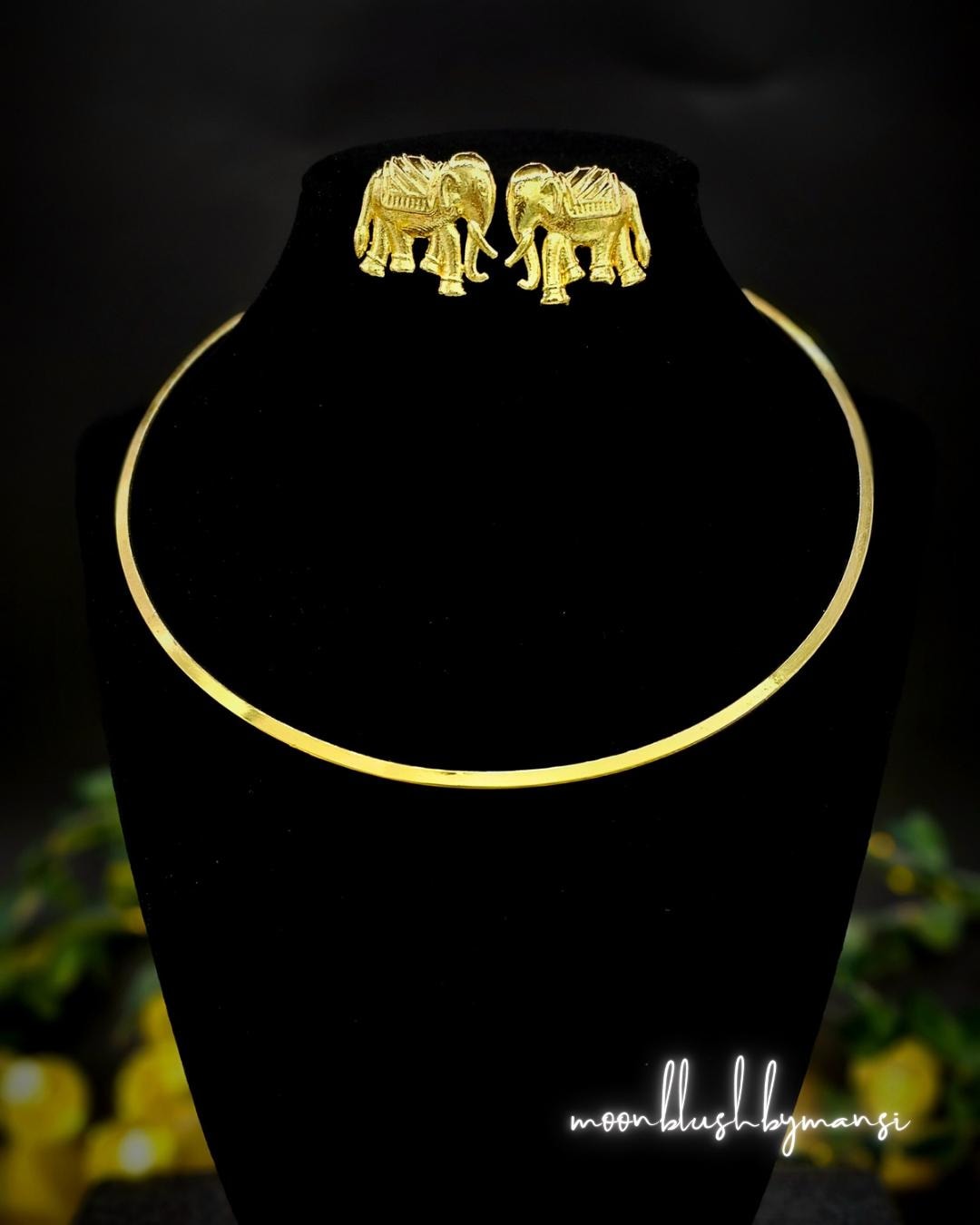 Gold Finished Hasli Necklace with Elephant Earrings: Indian Torque Set