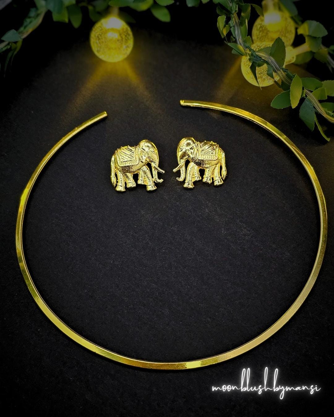 Gold Finished Hasli Necklace with Elephant Earrings: Indian Torque Set
