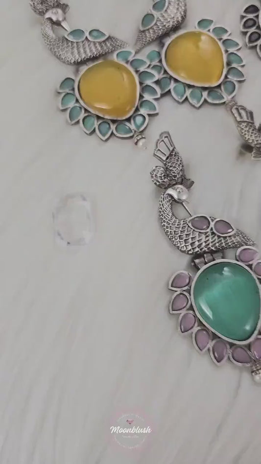 Dazzling Long earrings in unique pattern. Silver Replica with Monalisa Stones.