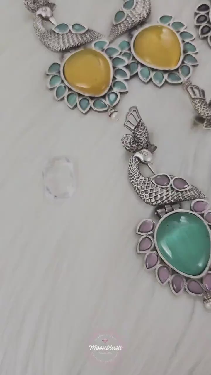 Dazzling Long earrings in unique pattern. Silver Replica with Monalisa Stones.